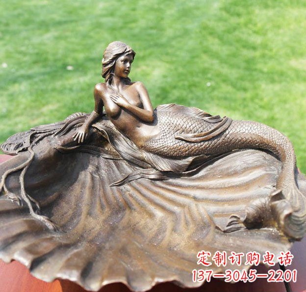 天津贝壳上的美人鱼园林景观铜雕