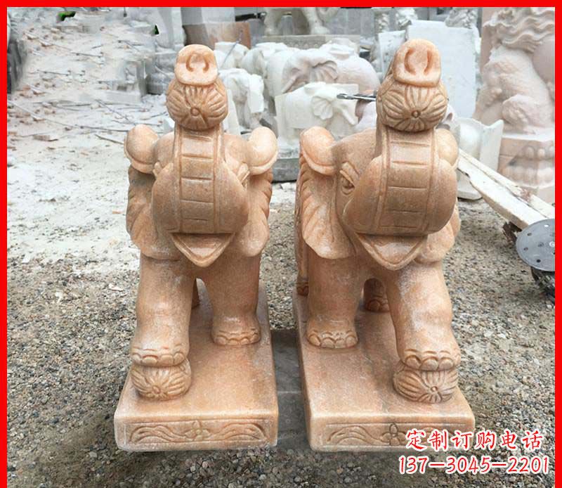 天津鼻卷绣球的小象石雕