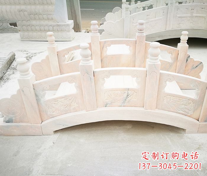 天津公园景观晚霞红石雕拱桥