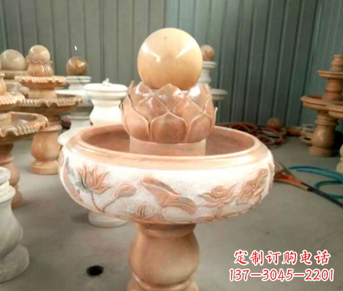 天津石来运转晚霞红风水球喷泉石雕