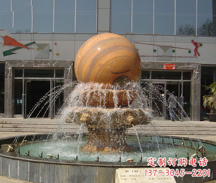 天津石来运转球晚霞红风水球石雕