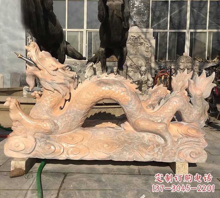 天津晚霞红石雕喷水龙