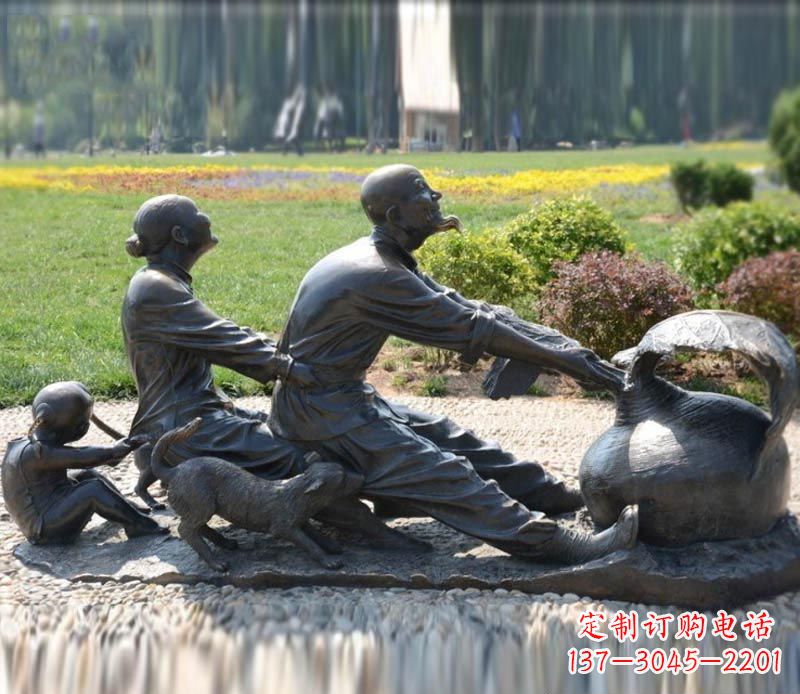 天津祖孙三人拔萝卜铜雕
